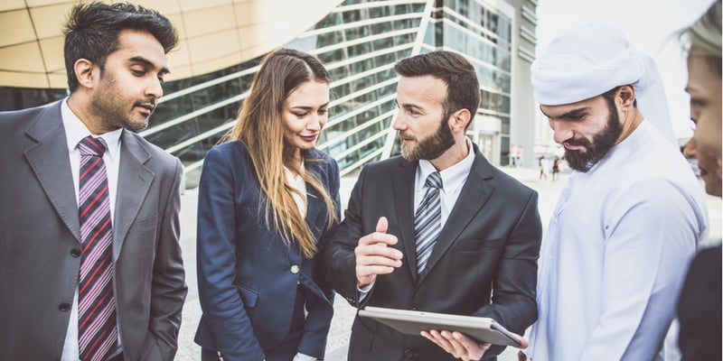 Group of business professionals chatting in Dubai